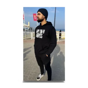 A man wearing My Own Abyss Hoodie in front